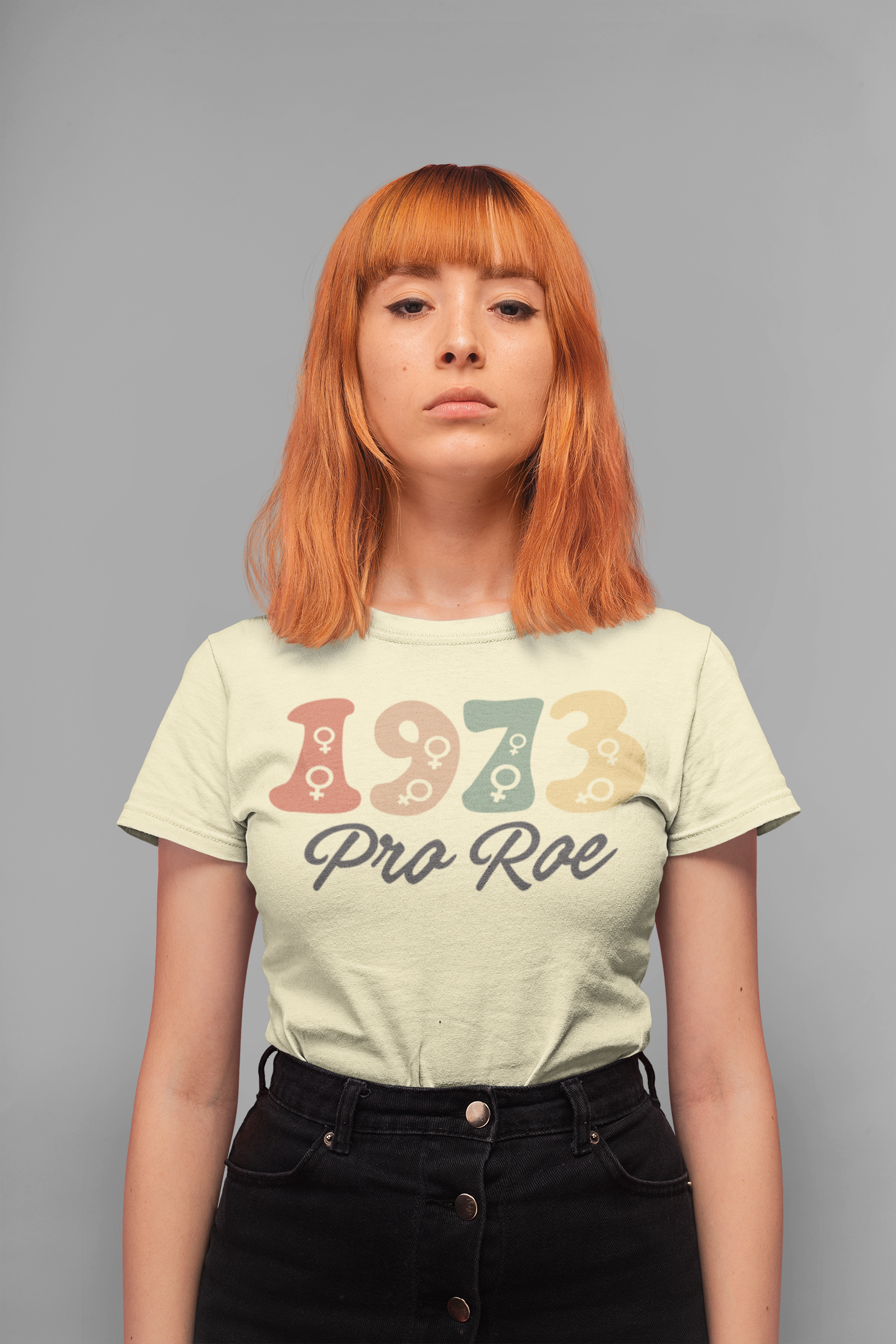 t-shirt-mockup-of-a-serious-faced-girl-standing-in-a-studio-20844.png