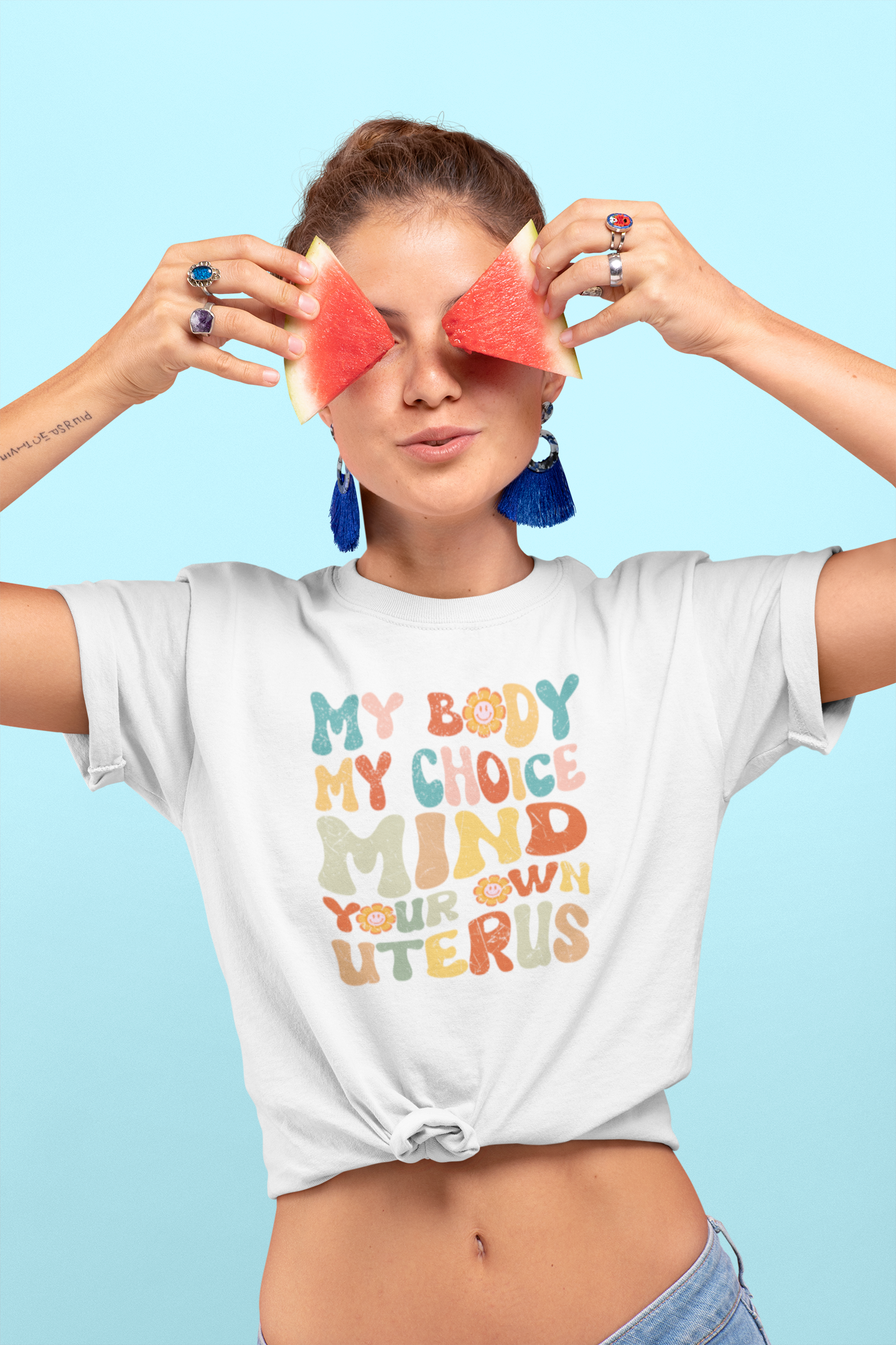 knotted-t-shirt-mockup-featuring-a-woman-covering-her-eyes-with-two-watermelon-slices-27097.png