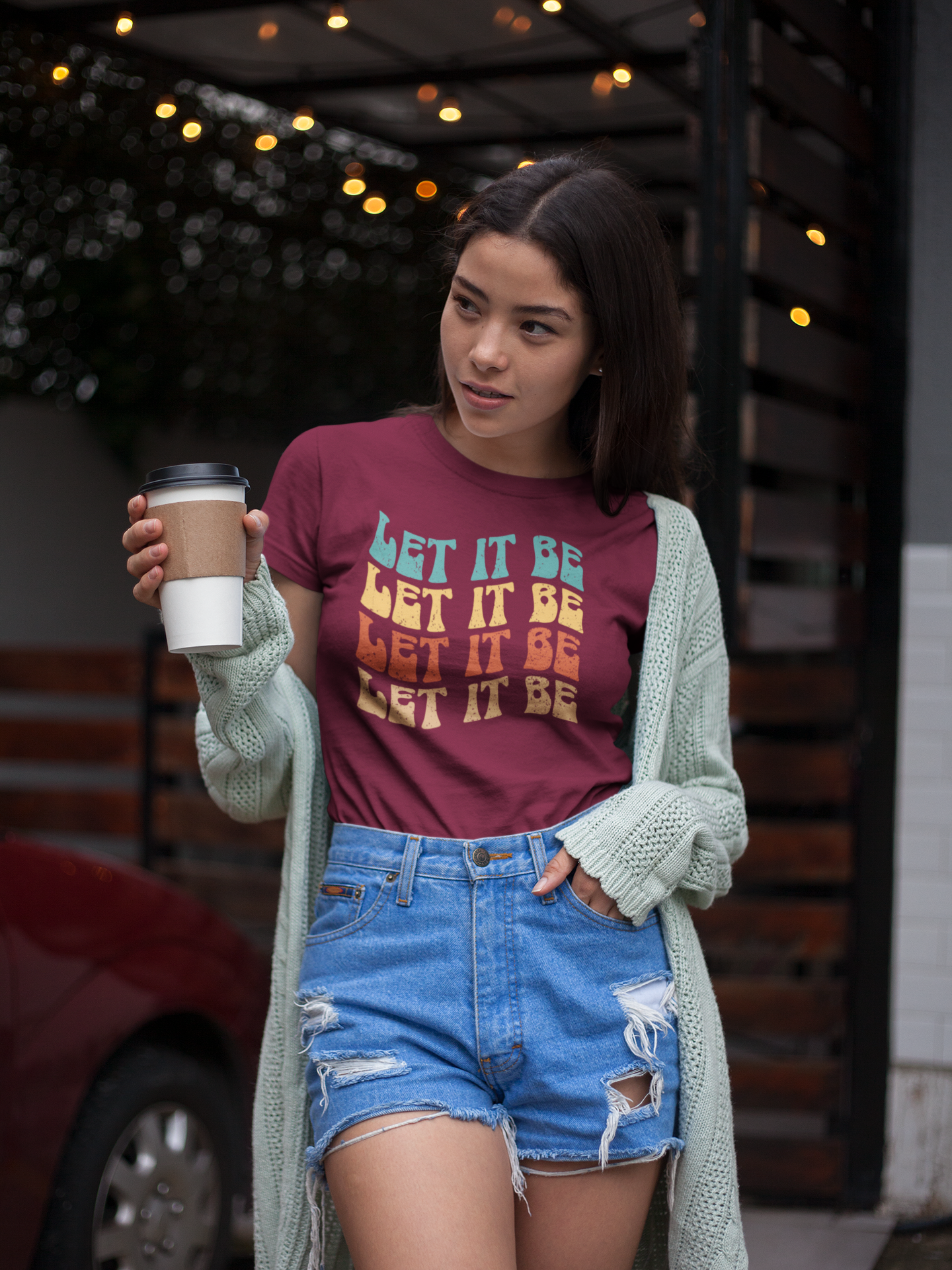 tshirt-mockup-of-an-asian-girl-having-a-coffee-outdoors-a17470.png