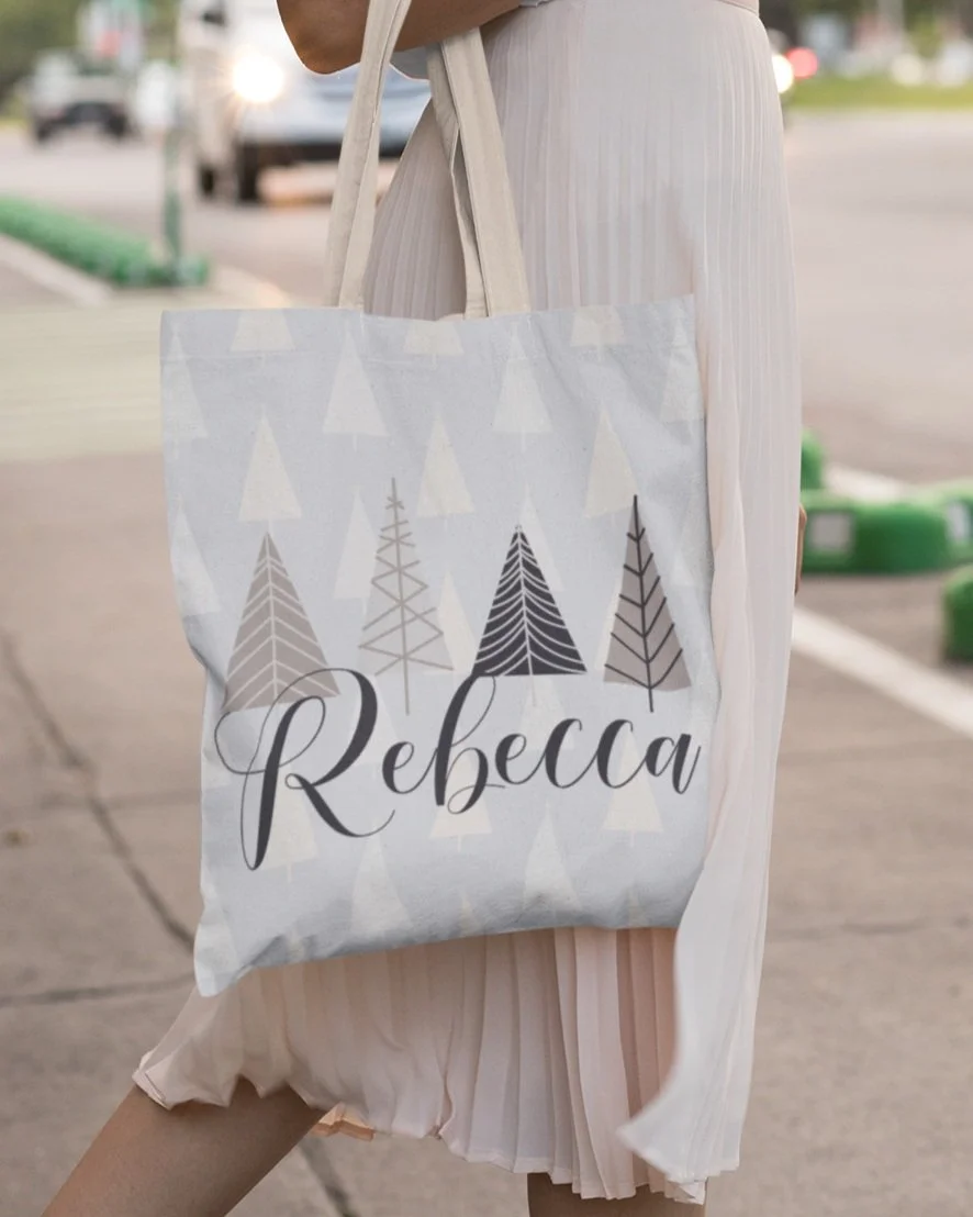 tote-bag-mockup-of-a-woman-with-headphones-on-the-street-29452.jpg