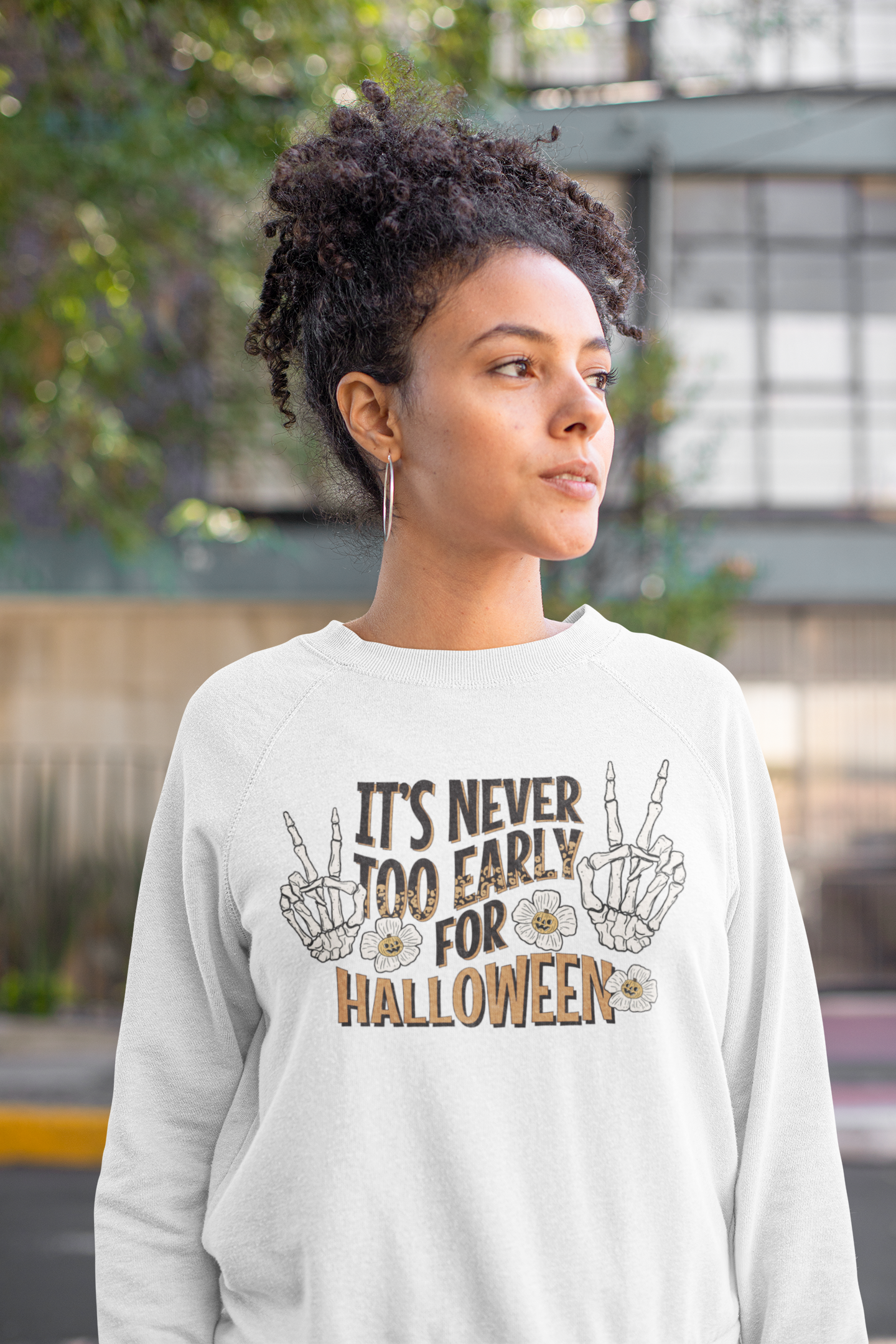 heathered-sweatshirt-mockup-of-a-curly-haired-woman-posing-on-the-street-23972a.png
