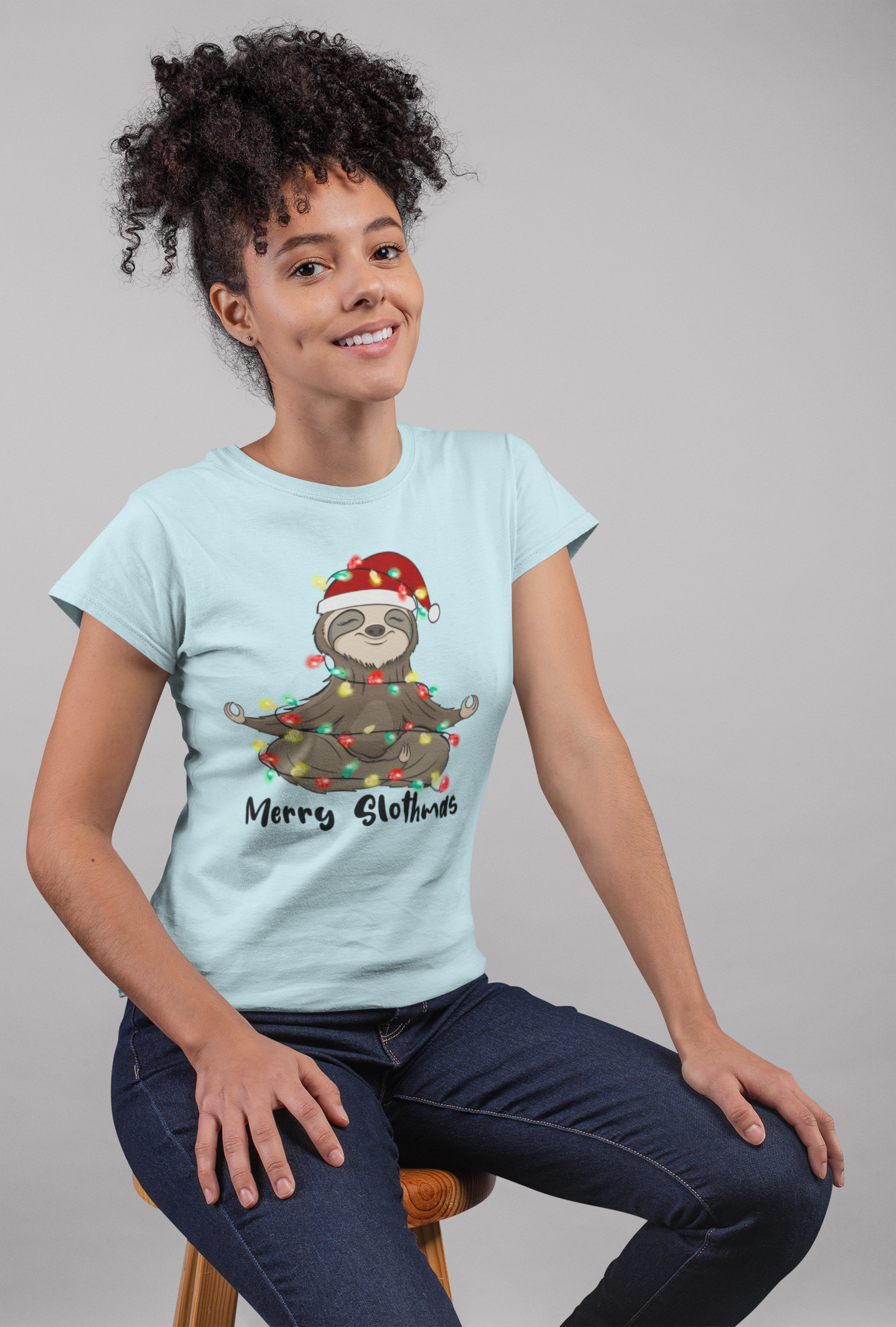 round-neck-tee-mockup-of-a-happy-girl-sitting-on-a-stool-24274.png