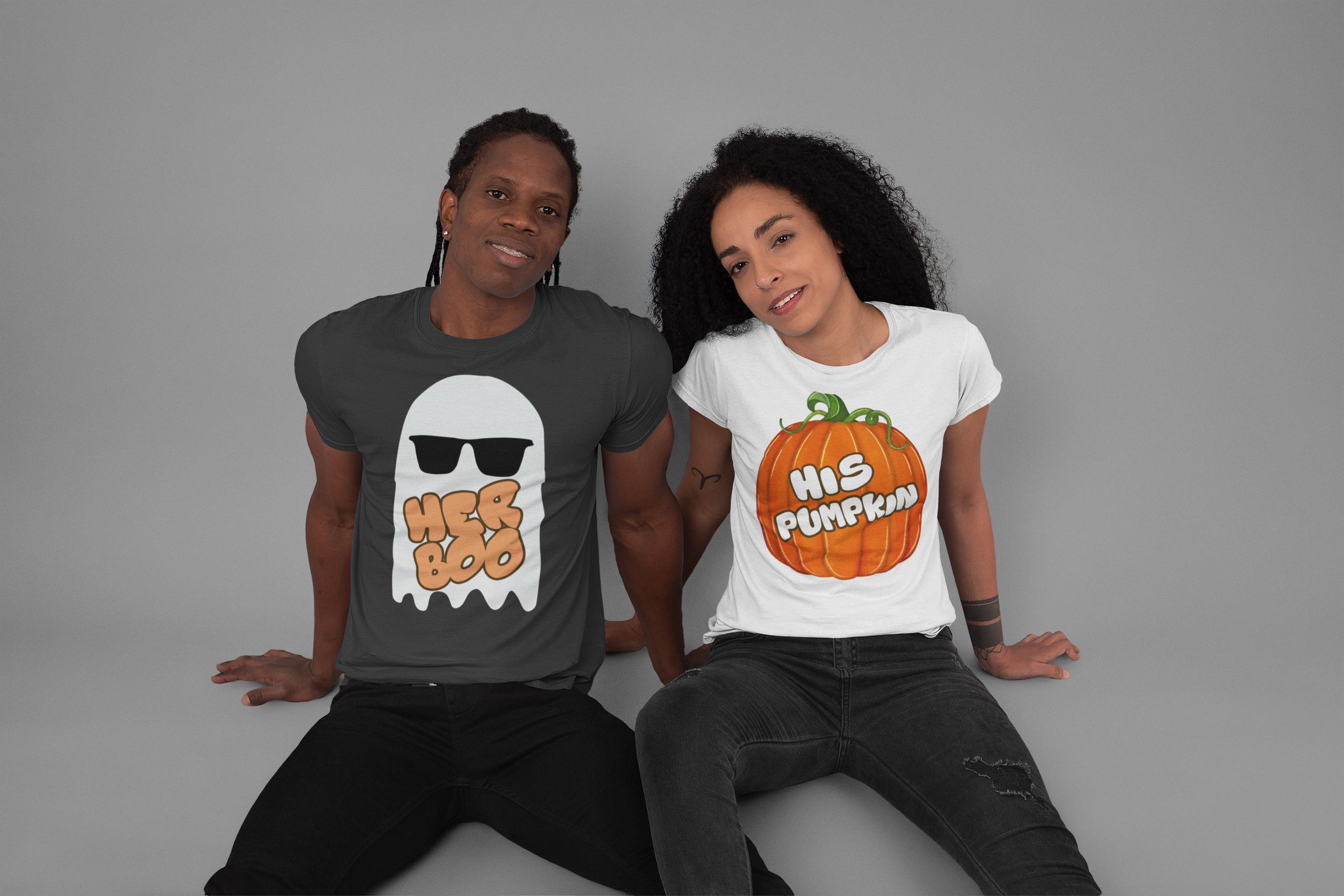 crew-neck-t-shirt-mockup-of-a-couple-sitting-at-a-studio-30763.png