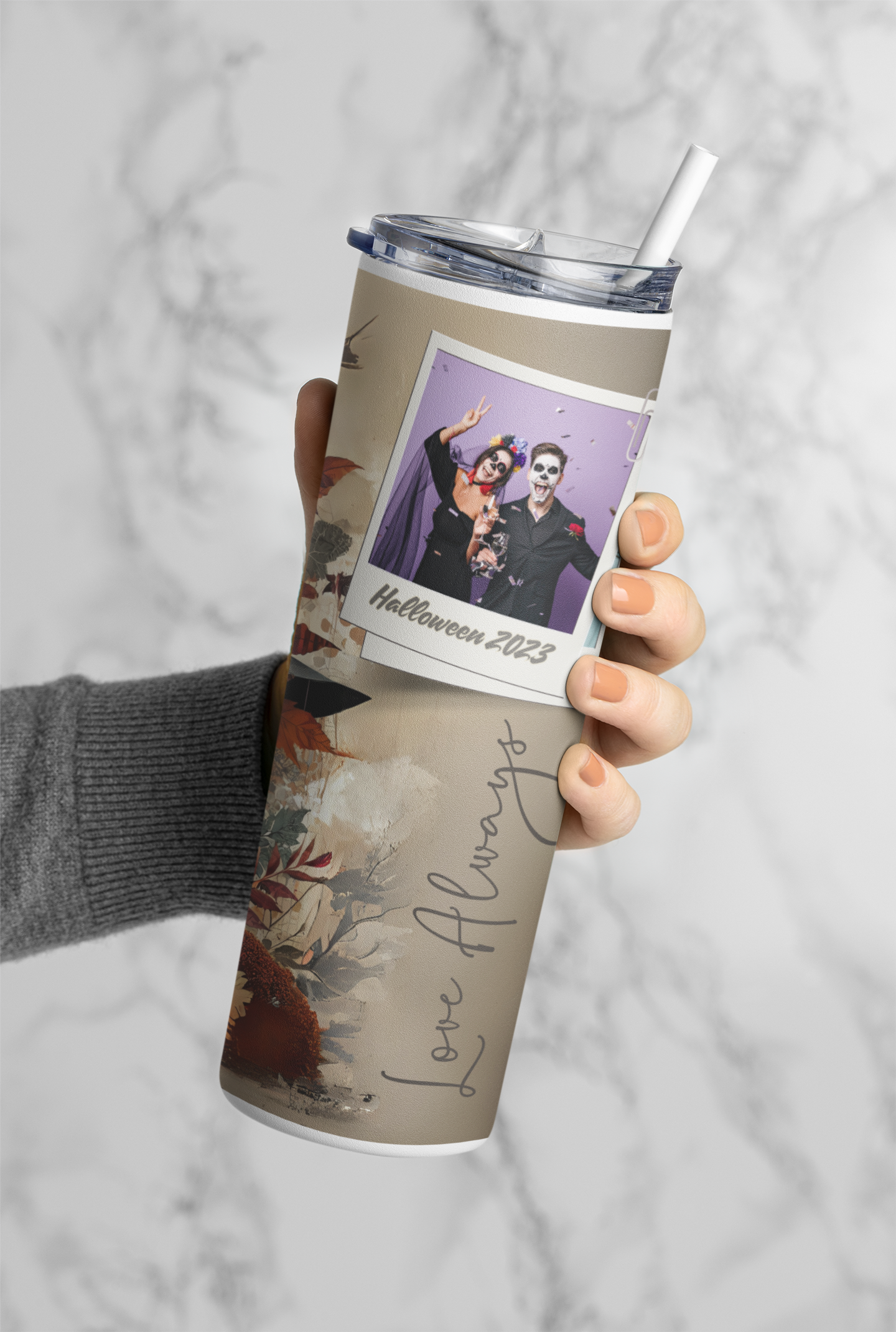 mockup-of-the-hand-of-a-woman-holding-a-skinny-tumbler-m21463.png