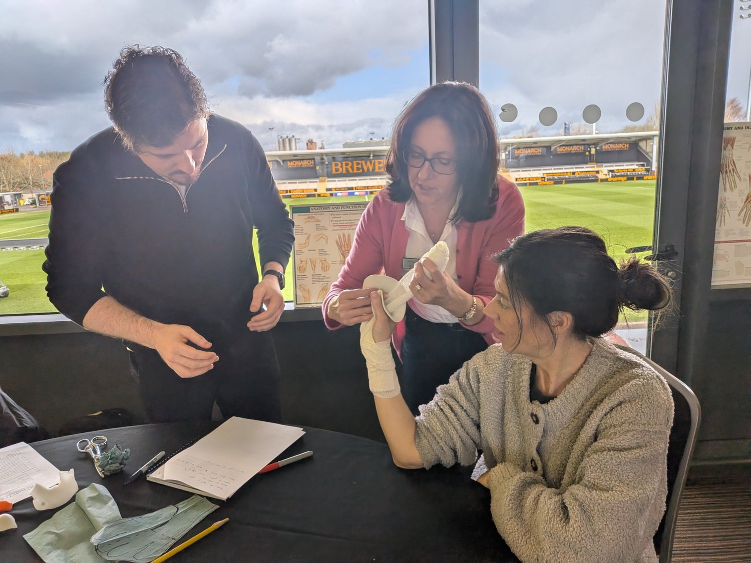 Occupational therapists participating in a hand splinting workshop