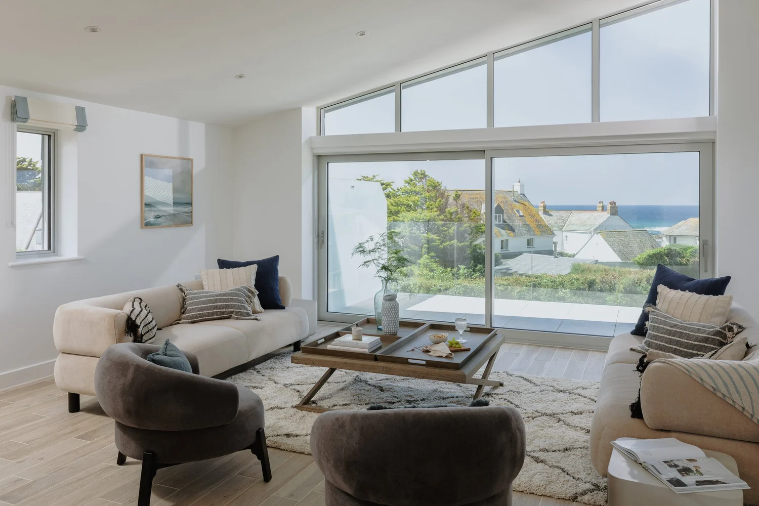 Open plan living room with sea view, Waterbeach Mews, Cornwall, photographed by Pip Hambling