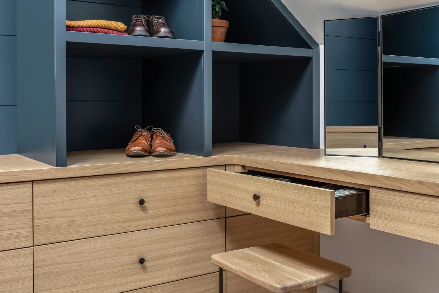 Oak and navy bespoke dressing room with built in dressing table, Rock