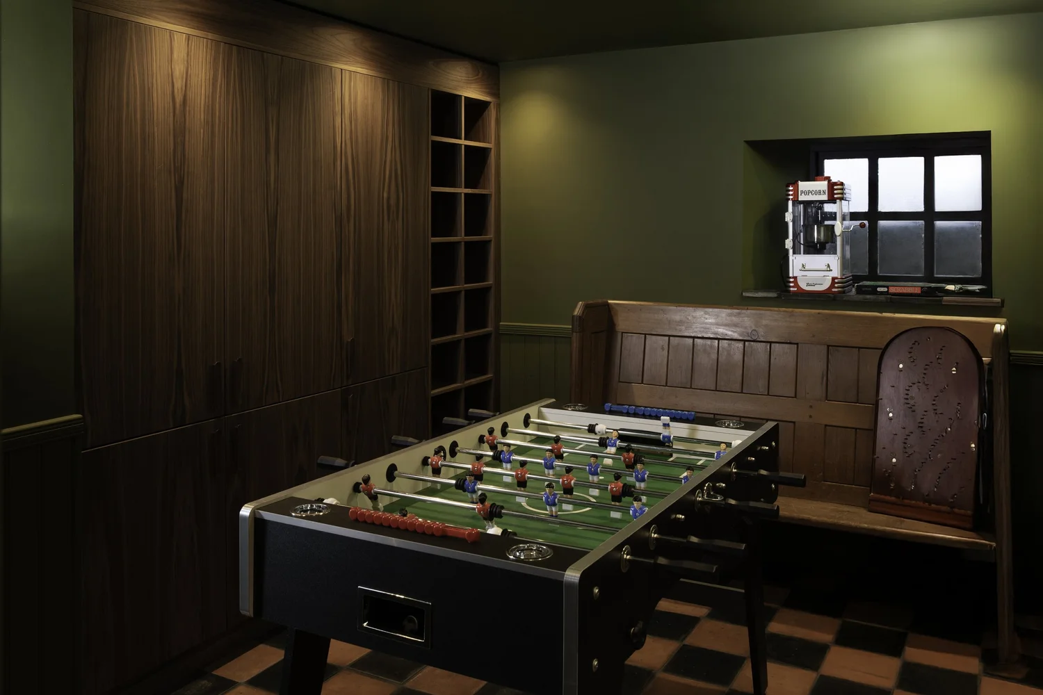 Games room with dark panelling at Zennor Sounds Studio, photographed by Pip Hambling