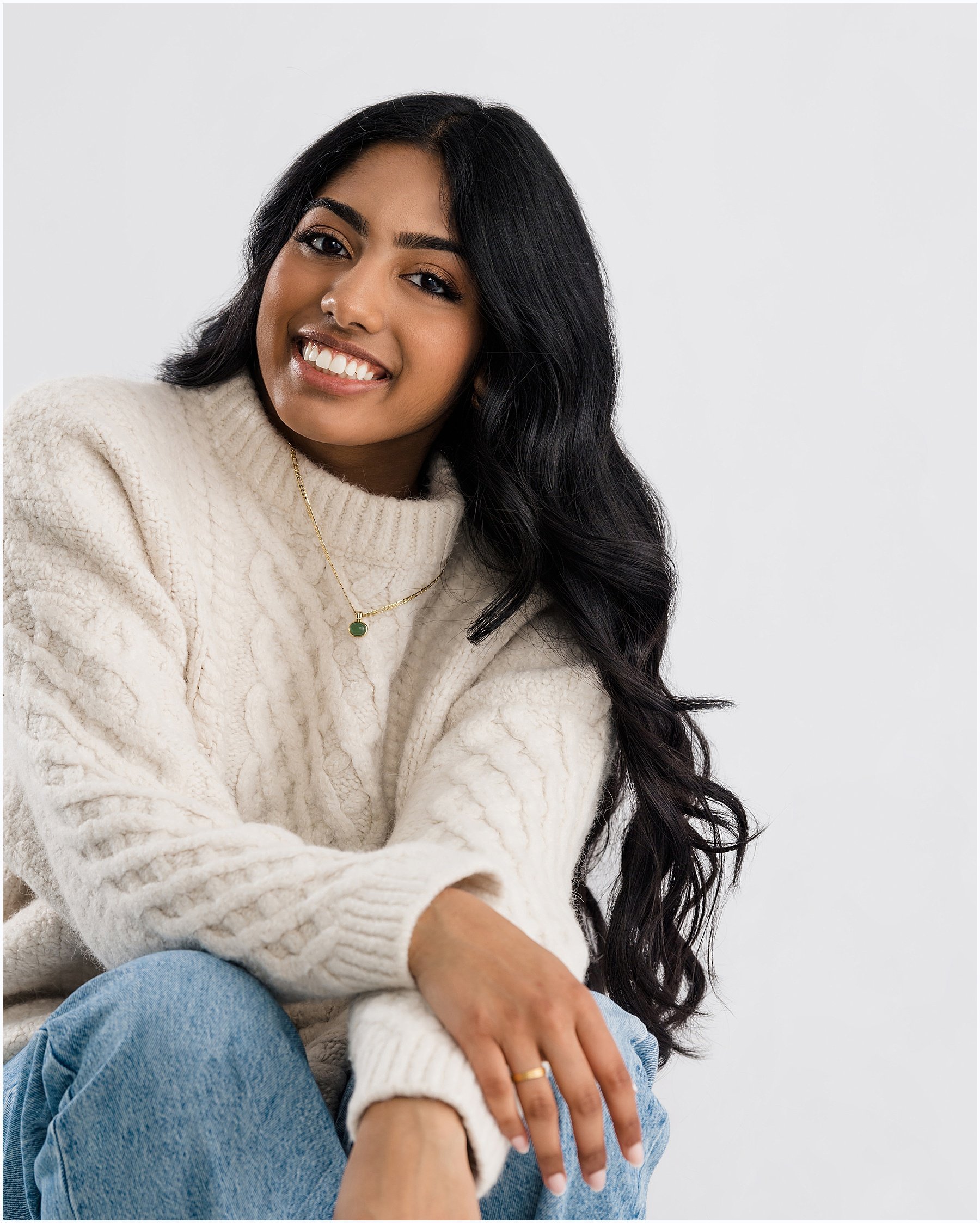 Indian female senior portraits in studio on white