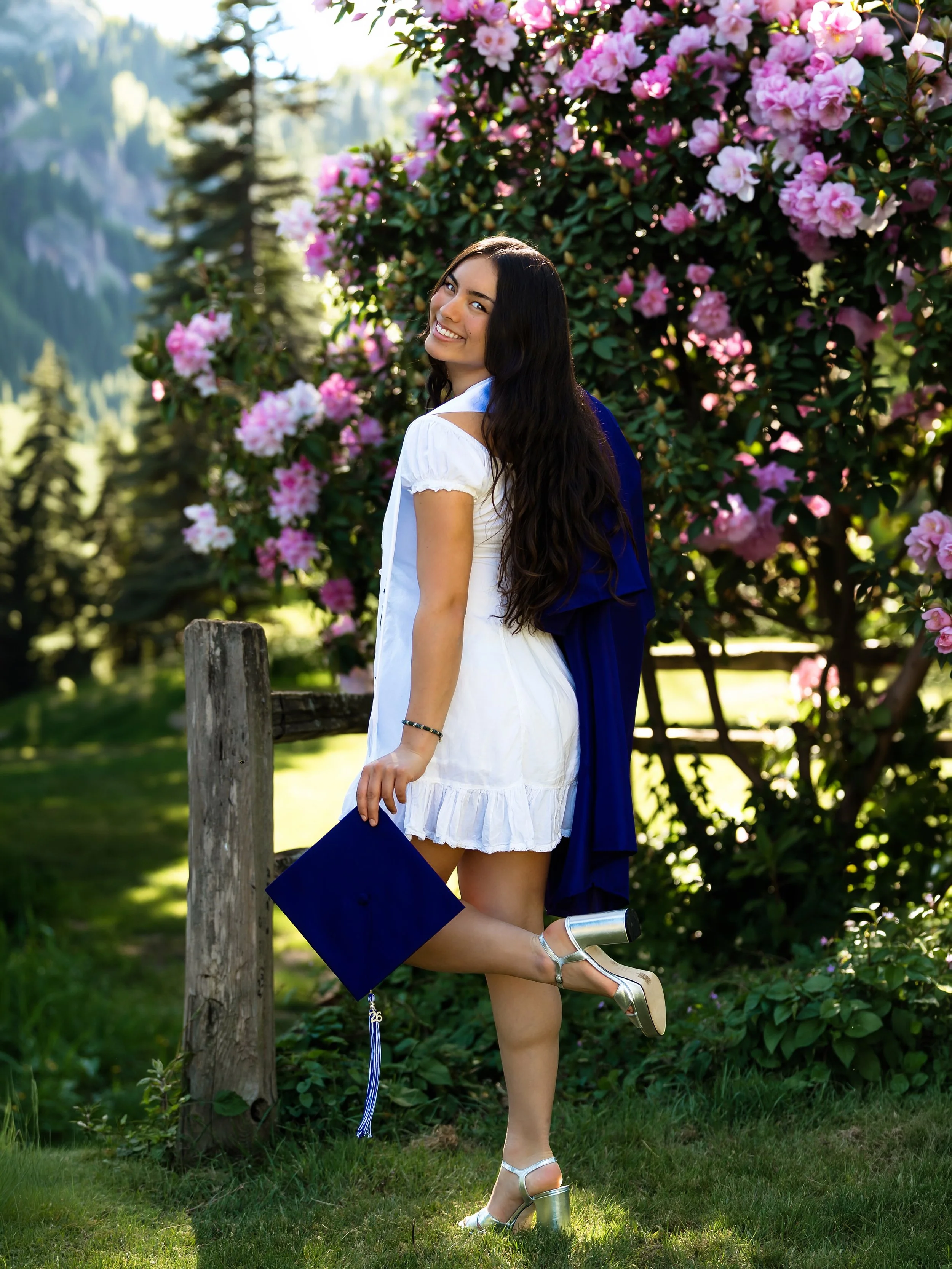 Senior Cap + Gown Experience inspired by springtime in the PNW 🤍✨

We have had the joy of photographing Dara throughout her junior and senior years on our brand ambassador team! We could not be more impressed by the confidence and kindness this gal 