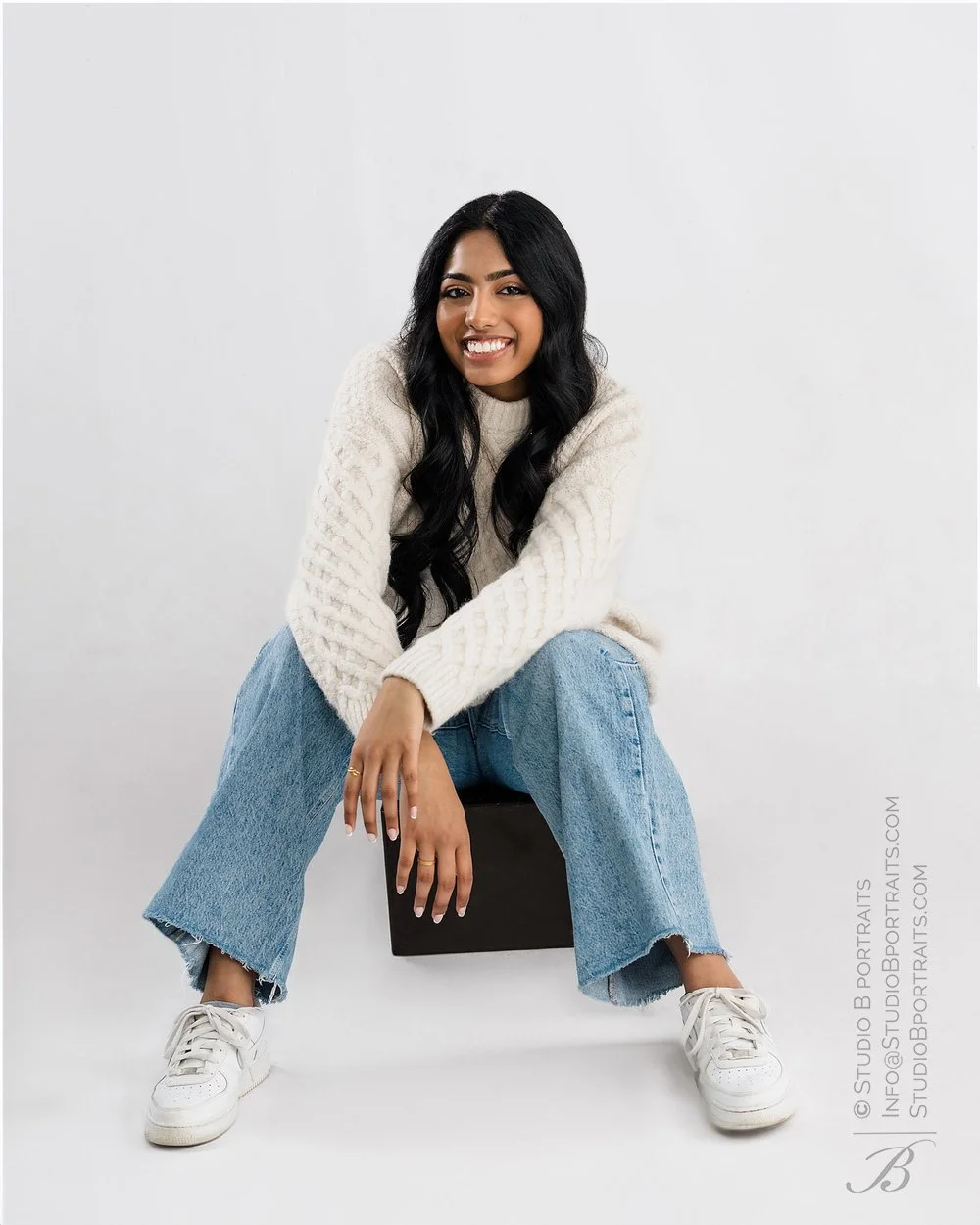 Indian female senior portraits in studio on white