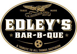 Logo for Edley's Bar-B-Que with an eagle and text 'A Tribute to All Things Southern'.