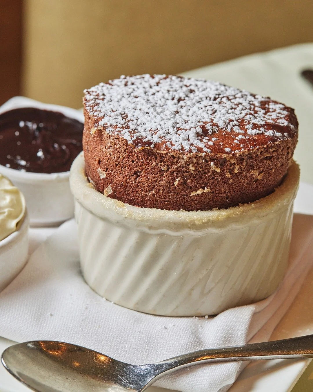 Dark Chocolate Souffl&eacute; with Valrhona dark chocolate &amp; chantilly.

📸 @briansamuelsphotography