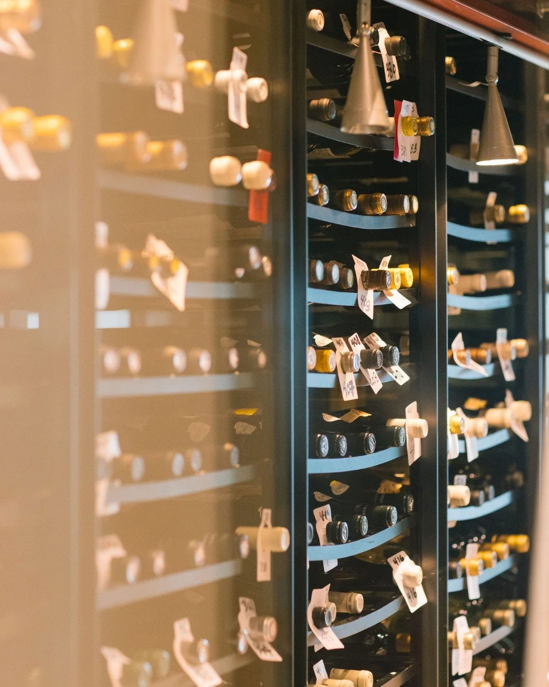 Explore our extensive wine list &mdash; our sommeliers are ready to guide you to your next favorite pour.

📸 @studionouveau_