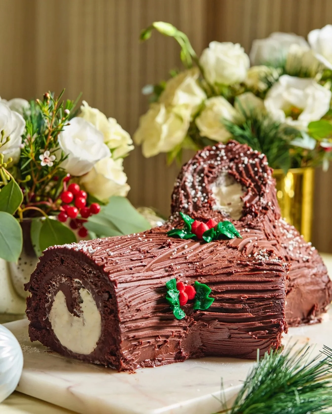 Celebrate the season with a beautifully crafted B&ucirc;che de No&euml;l from Executive Pastry Chef Tab Volpe. This classic French yule log &mdash; featuring a chocolate roulade sponge, marshmallow filling, and dark chocolate ganache &mdash; will be 