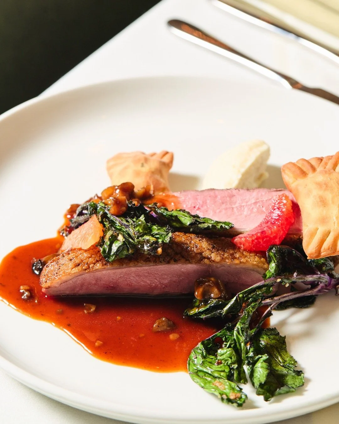 La Belle Farms Duck Breast | chestnut, foie gras barbajuan, celery root pur&eacute;e, kale

📸 @briansamuelsphotography