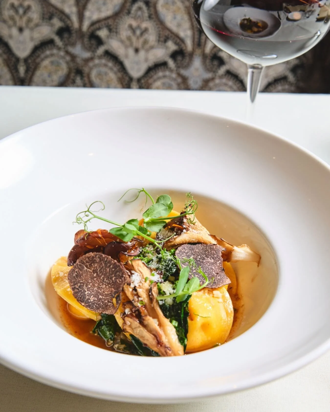 Chef Robert&rsquo;s spring tasting menu is almost here, which means there&rsquo;s only a few more days to enjoy your wintry favorites. Pictured: Swiss Chard Tortellini with ricotta, foraged mushroom, &amp; black winter truffle. 

📸: @briansamuelspho