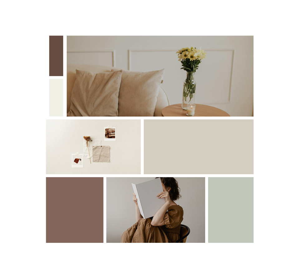 Living room with beige pillows, a vase of yellow flowers on a wooden table, small candle, design swatches, and a person holding a book in front of their face.
