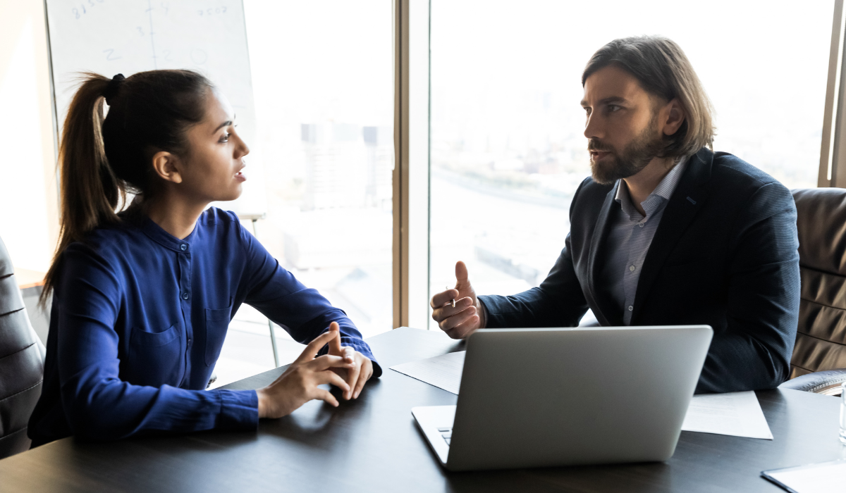 Leader navigating a professional conversation with their boss using a client-focused mindset