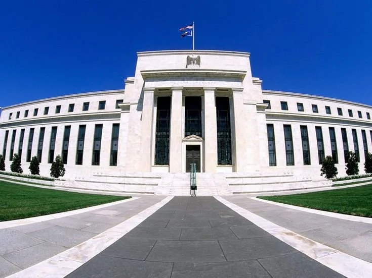 A quieter Federal Reserve could mean volatile markets, higher rates