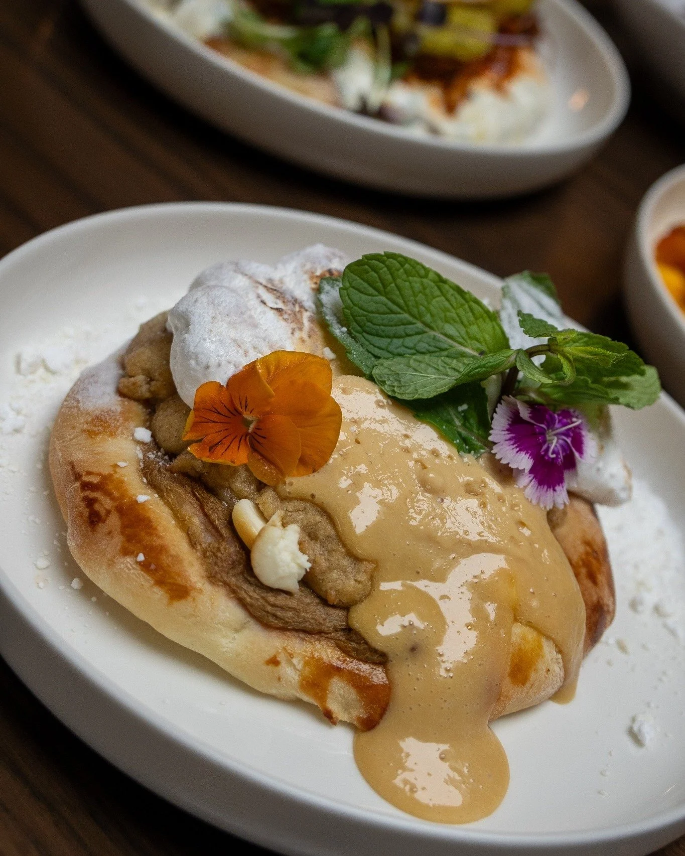 a sweet tooth's dream meal!

BAKED WINTER FRUIT PASTRY
oven baked doughnut pizza, rhubarb puree, white chocolate, toffee apple custard, cookie dough, italian meringue. 
add bacon if you want, you decide your destiny!

you know you want to try it, 
8 
