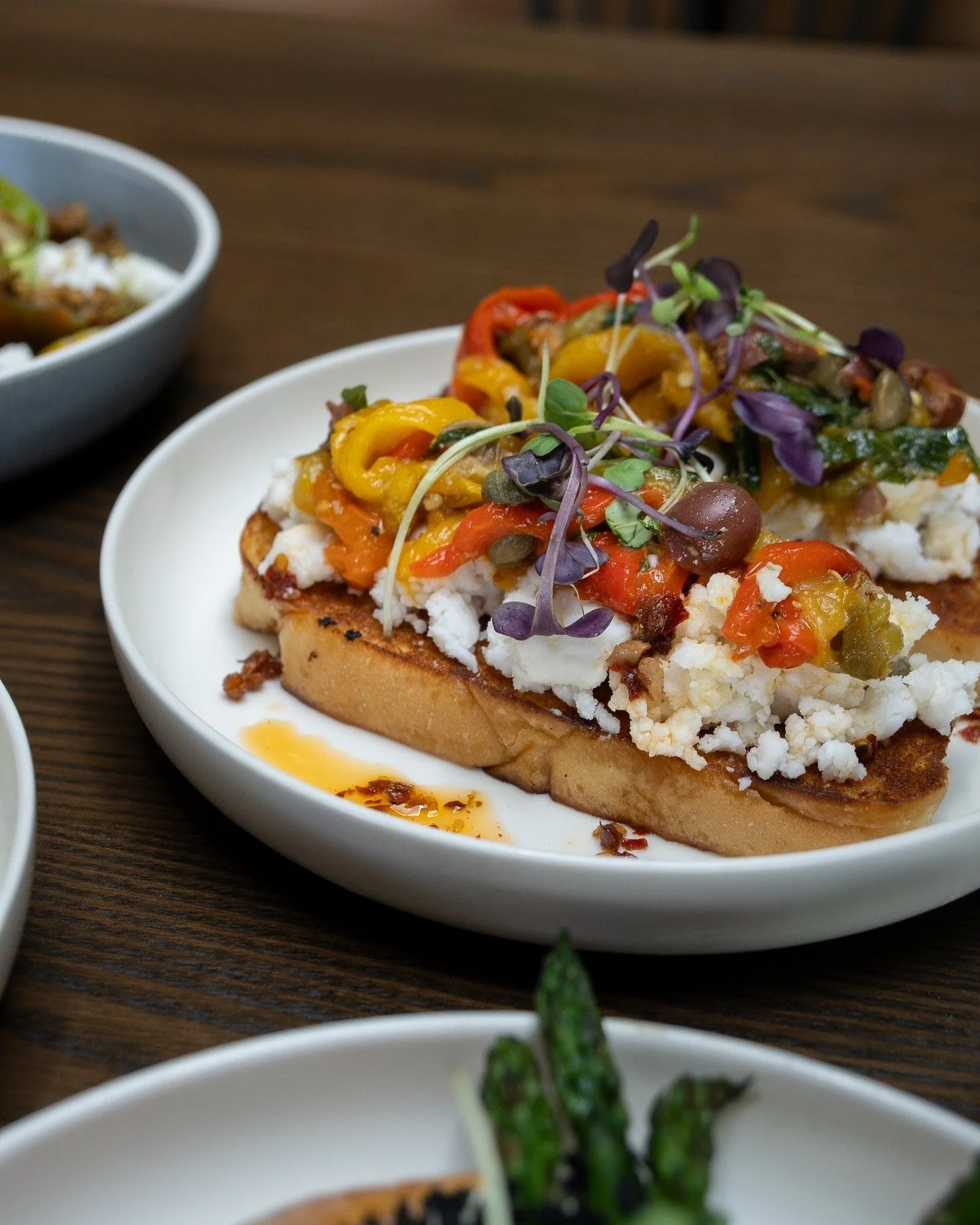 light, bright and delicious. 
the perfect light lunch. 

bruschetta
roast pepper and olive salsa, feta cream, chilli oil, on toasted milk bread.