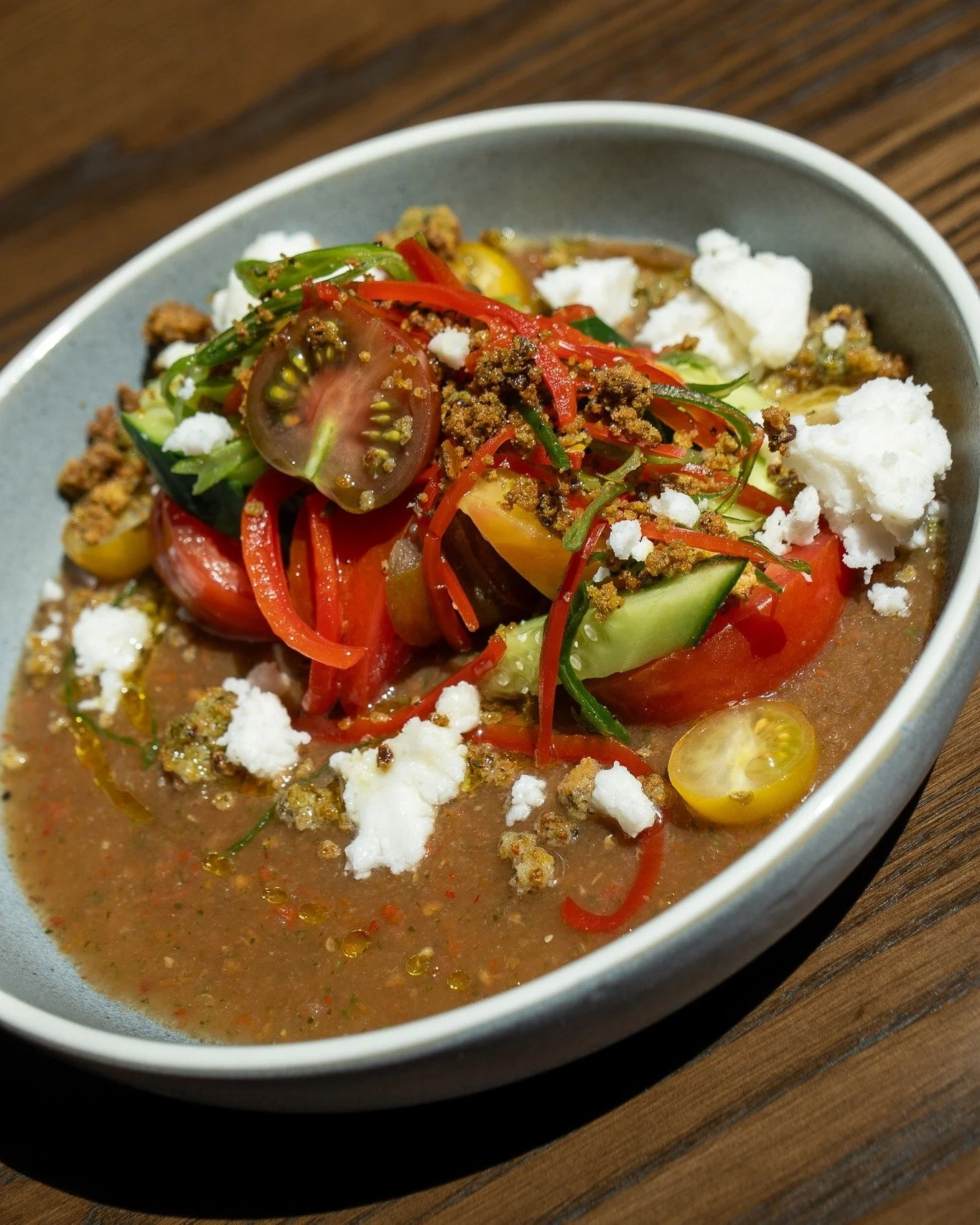 perfect for a hot summer day.

gazpacho salad
heirloom tomato, capsicum, basil, feta whip, pangrattato, gazpacho dressing.