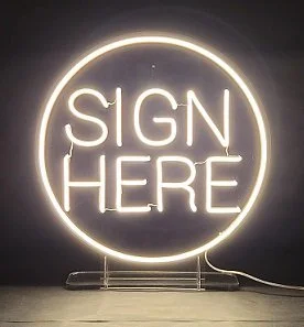 SIGN HERE neon sign by Classic Pro DJ, perfect for guest books at weddings and events in Dallas-Fort Worth