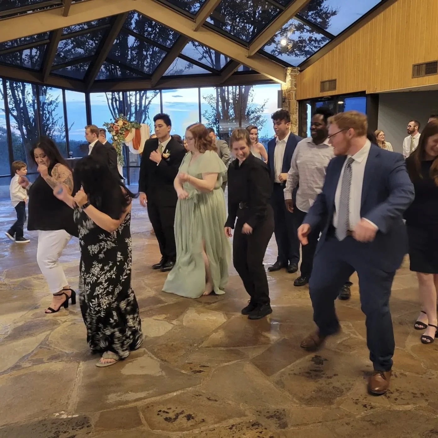 Joyful wedding party dancing at a Dallas area reception, entertainment by Classic Pro DJ