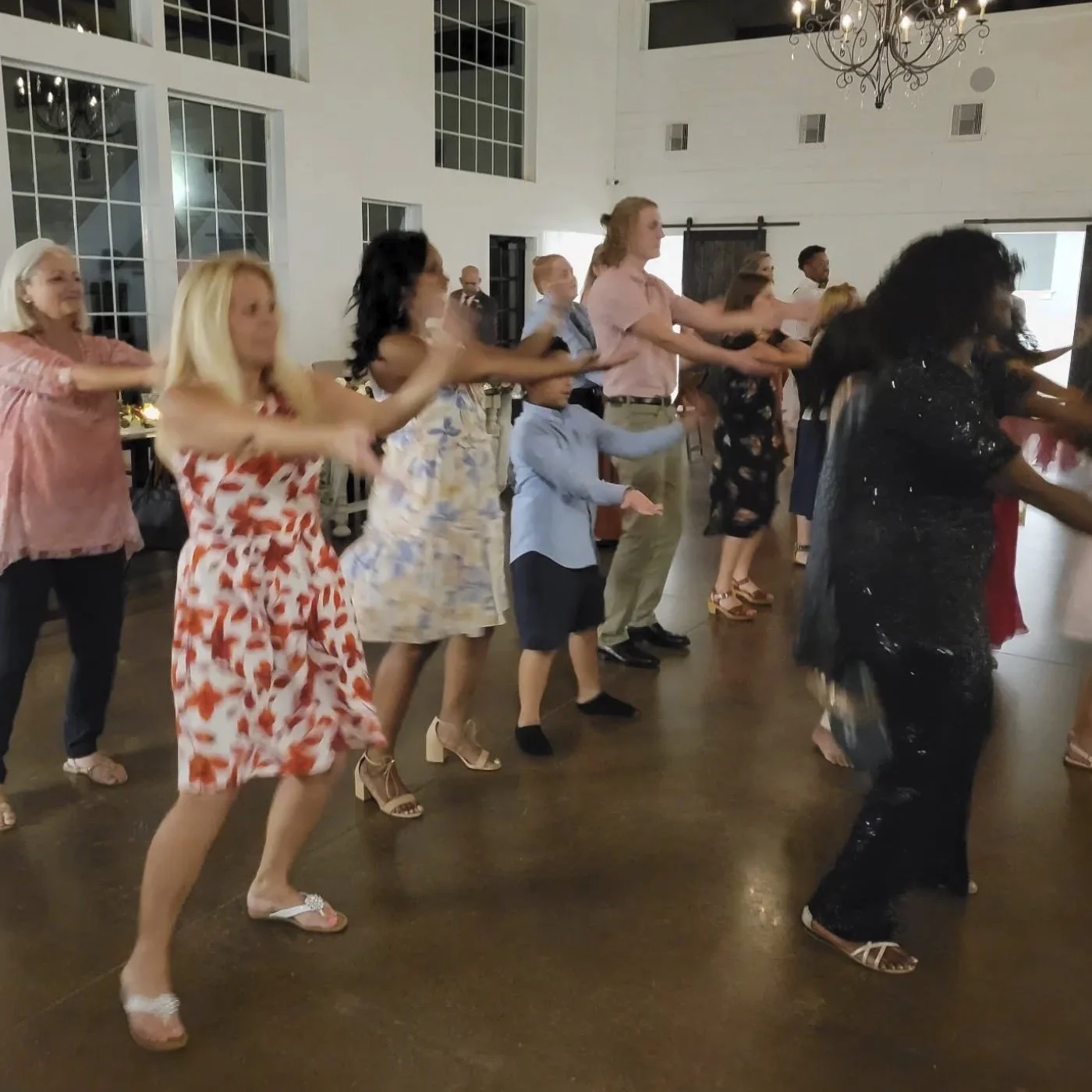 Energetic group enjoying the dance floor at a Fort Worth party, music by Classic Pro DJ