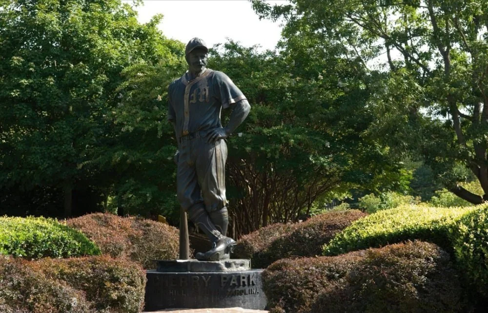 The Mighty Casey statue standing proudly at Cherry Park, Rock Hill.