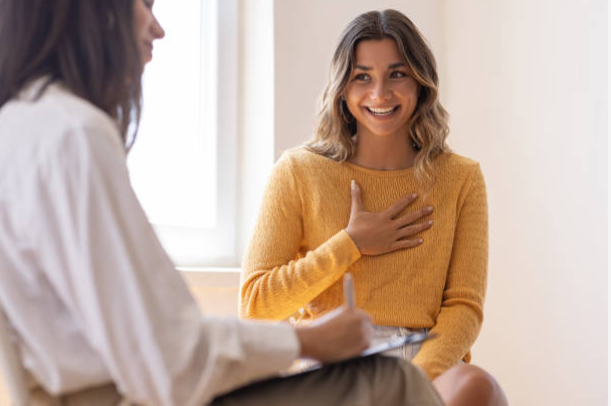 millennial girl smiling in therapy