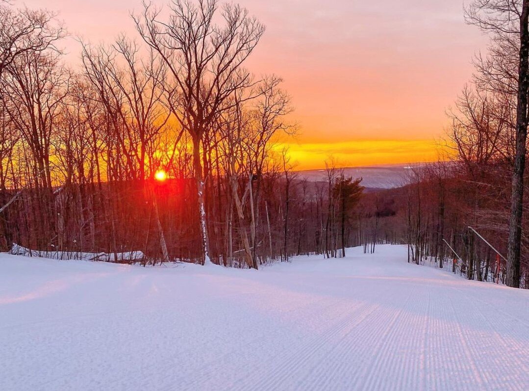 Only thing better than a freshly groomed run is carving through it as the sun rises.
. 
@bristol_mountain offers 1200&prime; vertical feet, breathtaking views, and a variety of inclines for every skier and snowboarder from beginner to expert.
.
That&