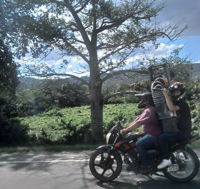 Honduras still makes me smile: driving down the highway and passing these 2 workers. (4/4/26)