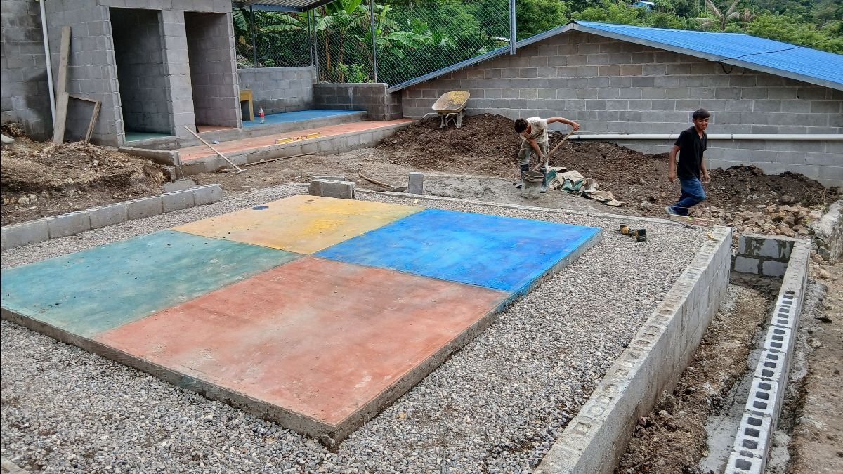 David and Axel continue to work on the bathroom area. The sewer systems here are just big holes, so we decided to make a 4-square area on top of it as the covering. Friday was the first time we used it, and the kids are enjoying the game! (6/21/25)