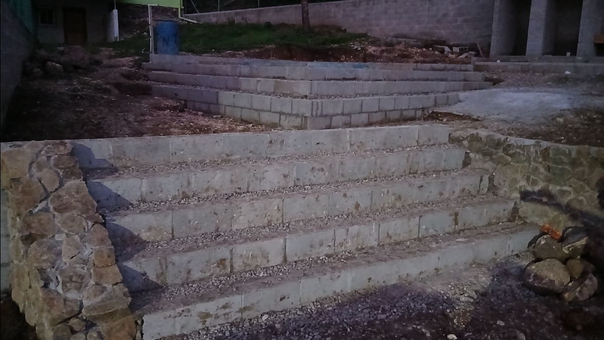 David and Axel continue to lay block and develop the bathroom area around the activity center. (7/5/25)