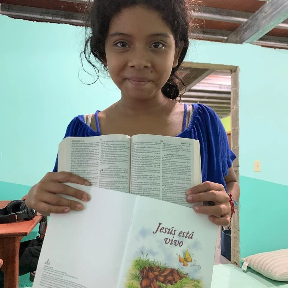 One day Wendy was at the activity center reading one of the children's books about a Bible story, and she remembered where it was in the Bible. Opening up the Bible to find it, she was excited to show Vivien! (8/16/25)