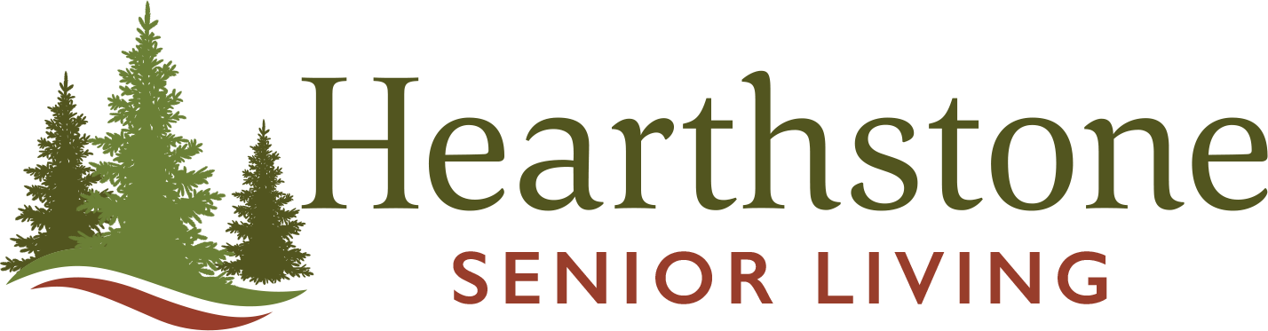 Hearthstone Senior Living logo: a digital graphic design illustrating a landscape with green trees.