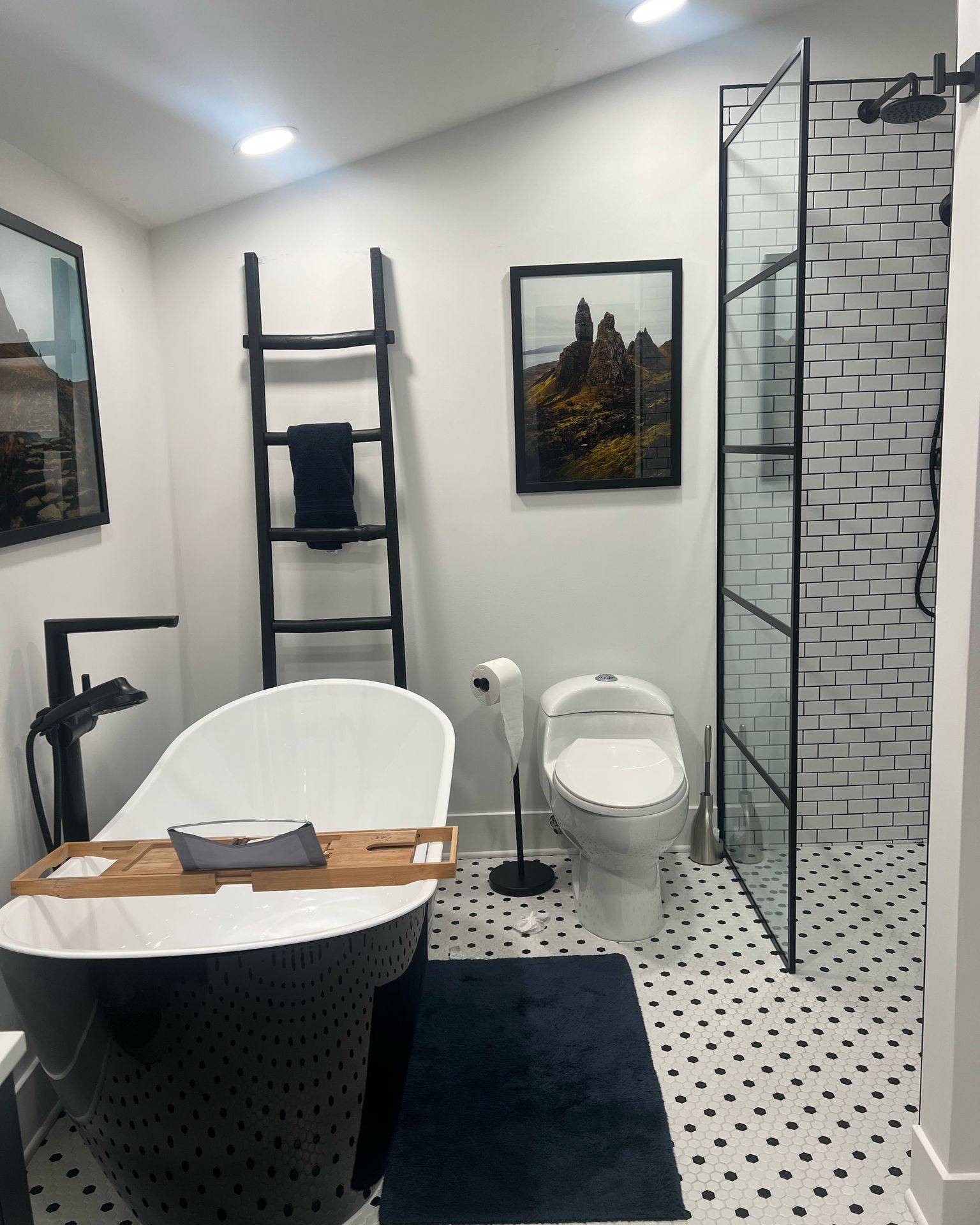 Stepping into luxury has never been easier! 💫 This stunning bathroom renovation showcases the beauty of a walk-in shower designed with both style and accessibility in mind. The sleek barrier-free entry means no climbing over tub edges - just pure, e