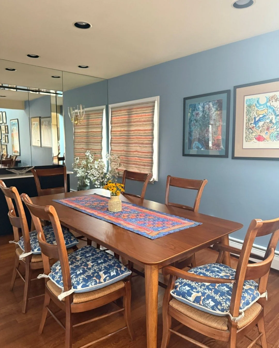 These seat cushions with this gorgeous fabric from Root Cellar are the real stars of this dining room! We took these classic wood chairs and gave them new life with a beautiful patterned upholstery that anchors the room perfectly. Often one element l