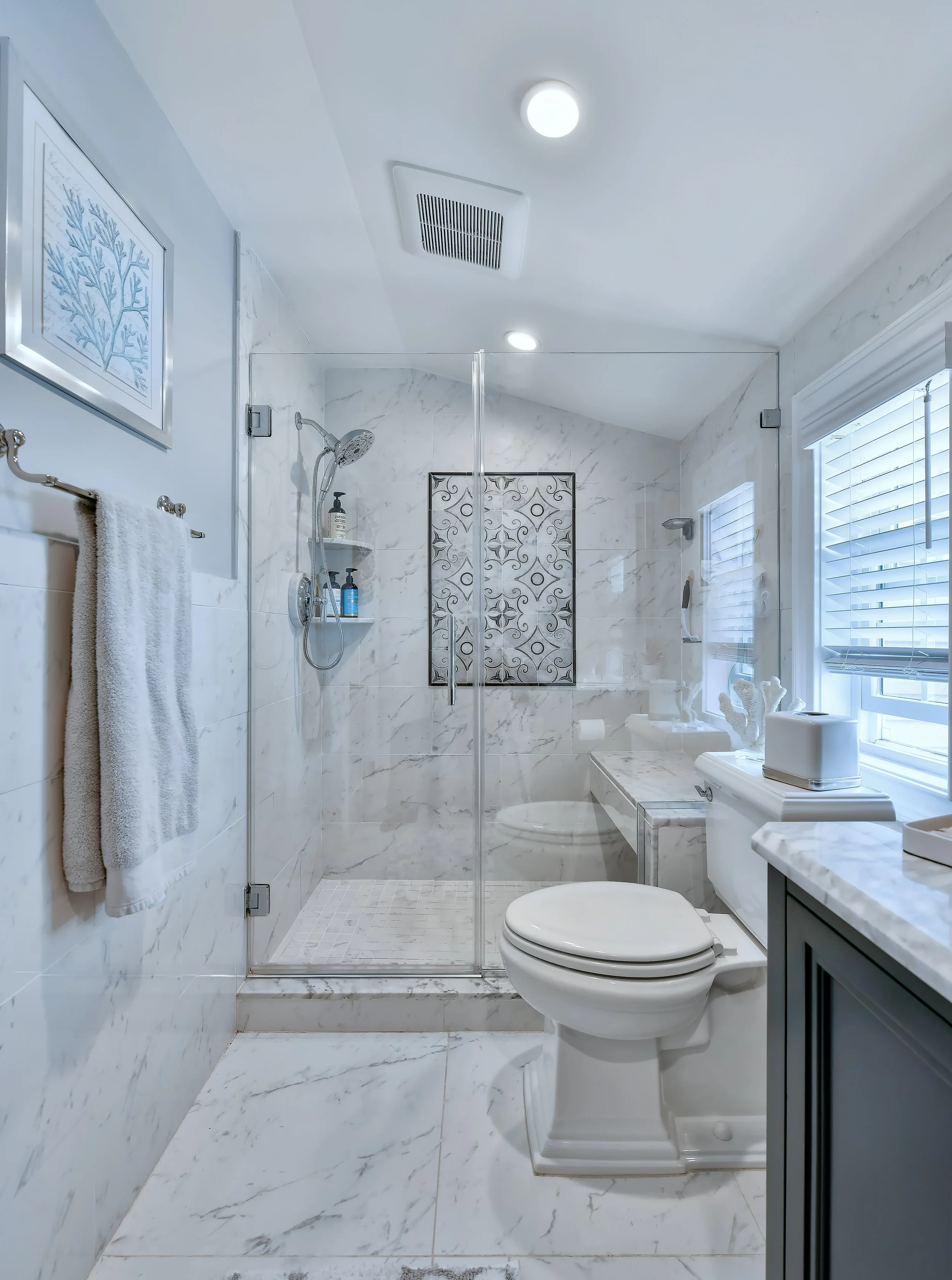 massapequa-powder-room-geometric-wallpaper-design.jpg