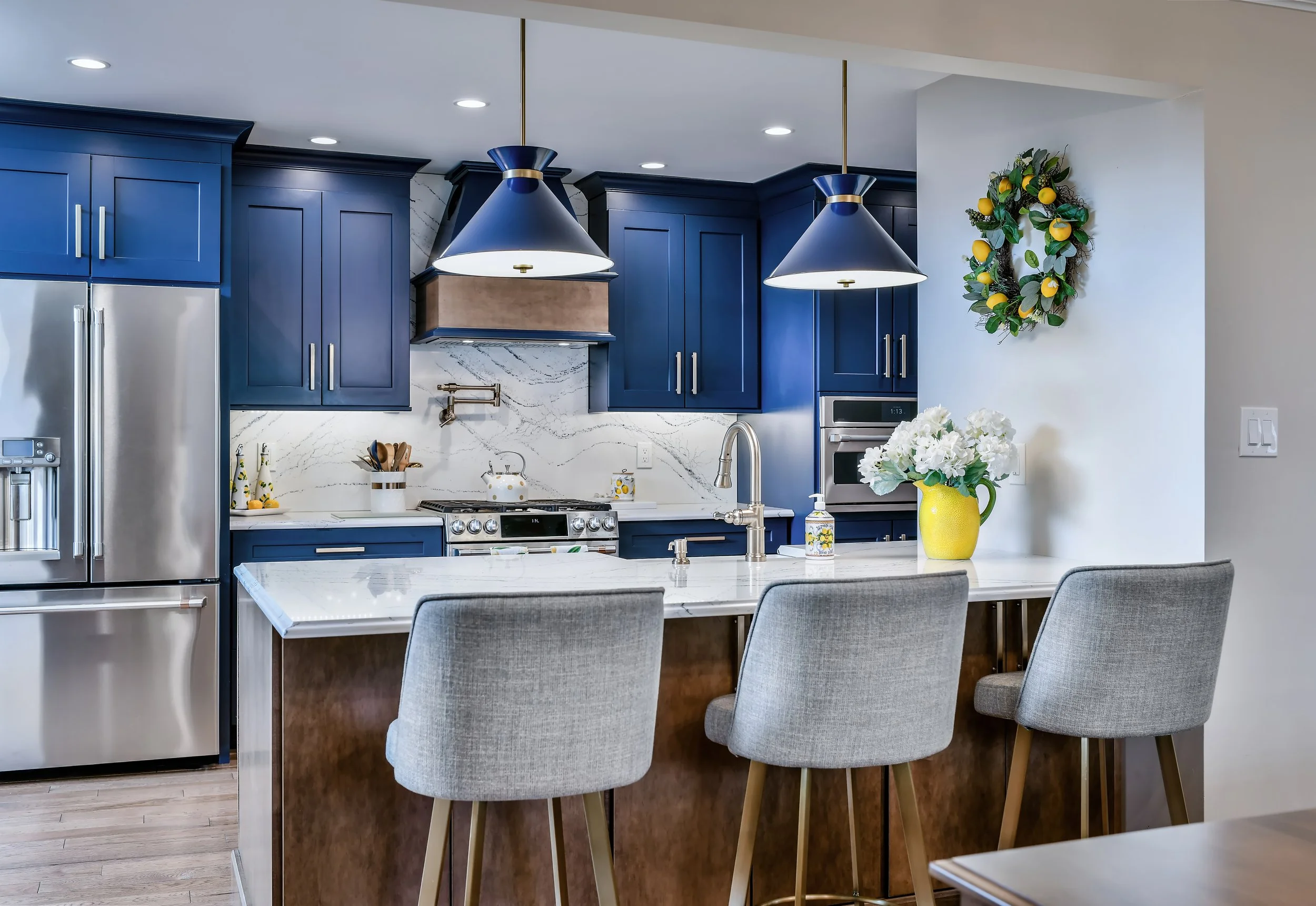 massapequa-dream-kitchen-blue-cabinets-marble-countertops.jpg