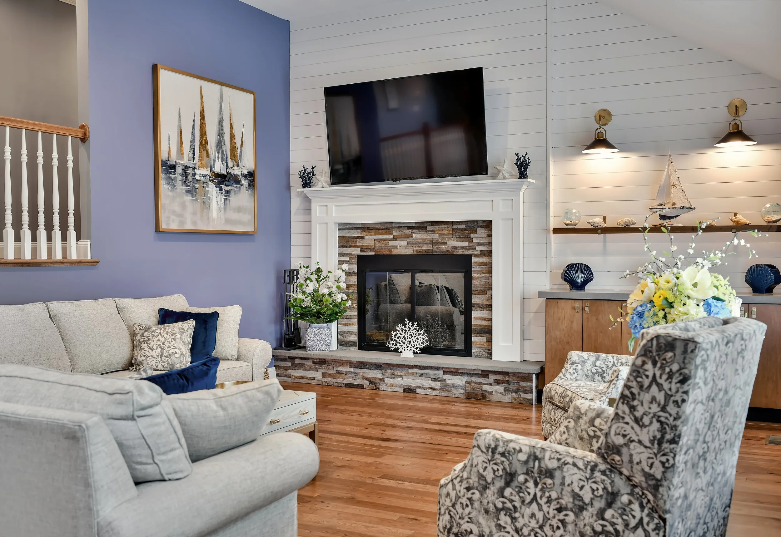 massapequa-living-room-stone-fireplace-shiplap-wall.jpg