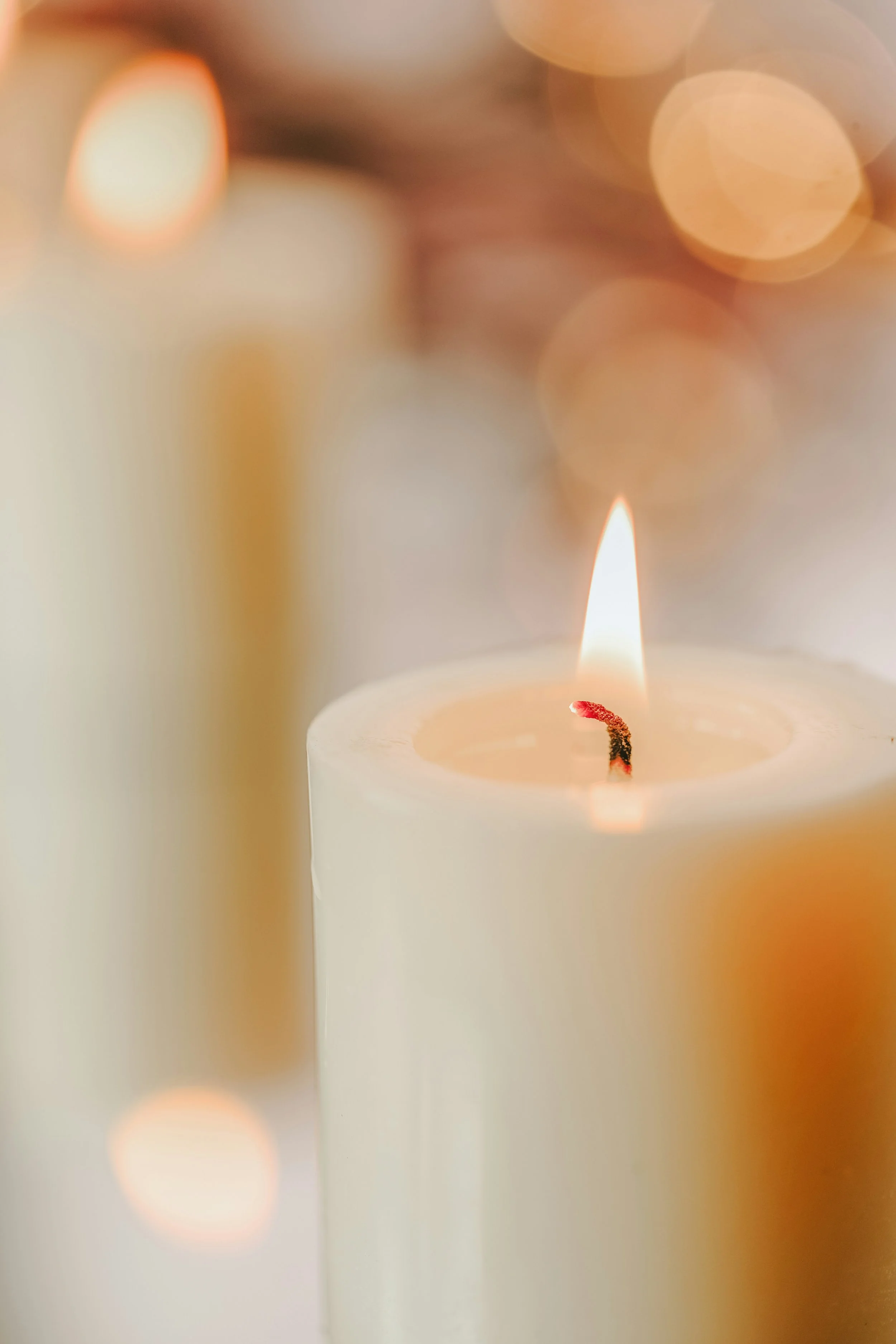 A single candle in the early morning hours