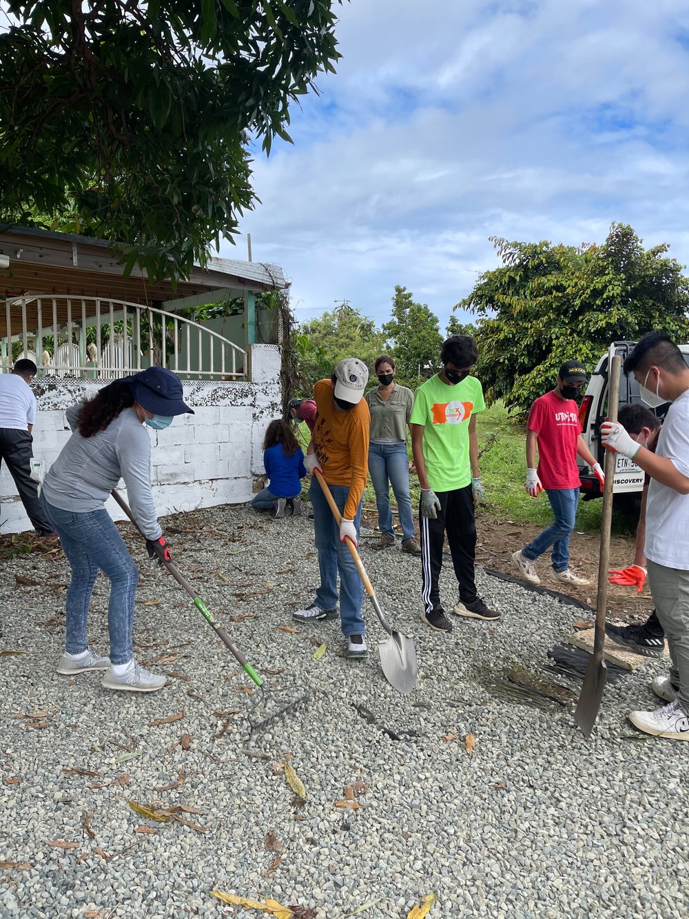  Volunteers removing gravel from floor 