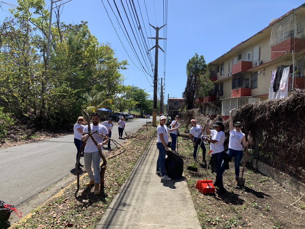  AD&amp;V team members picking up trash for cleanup 