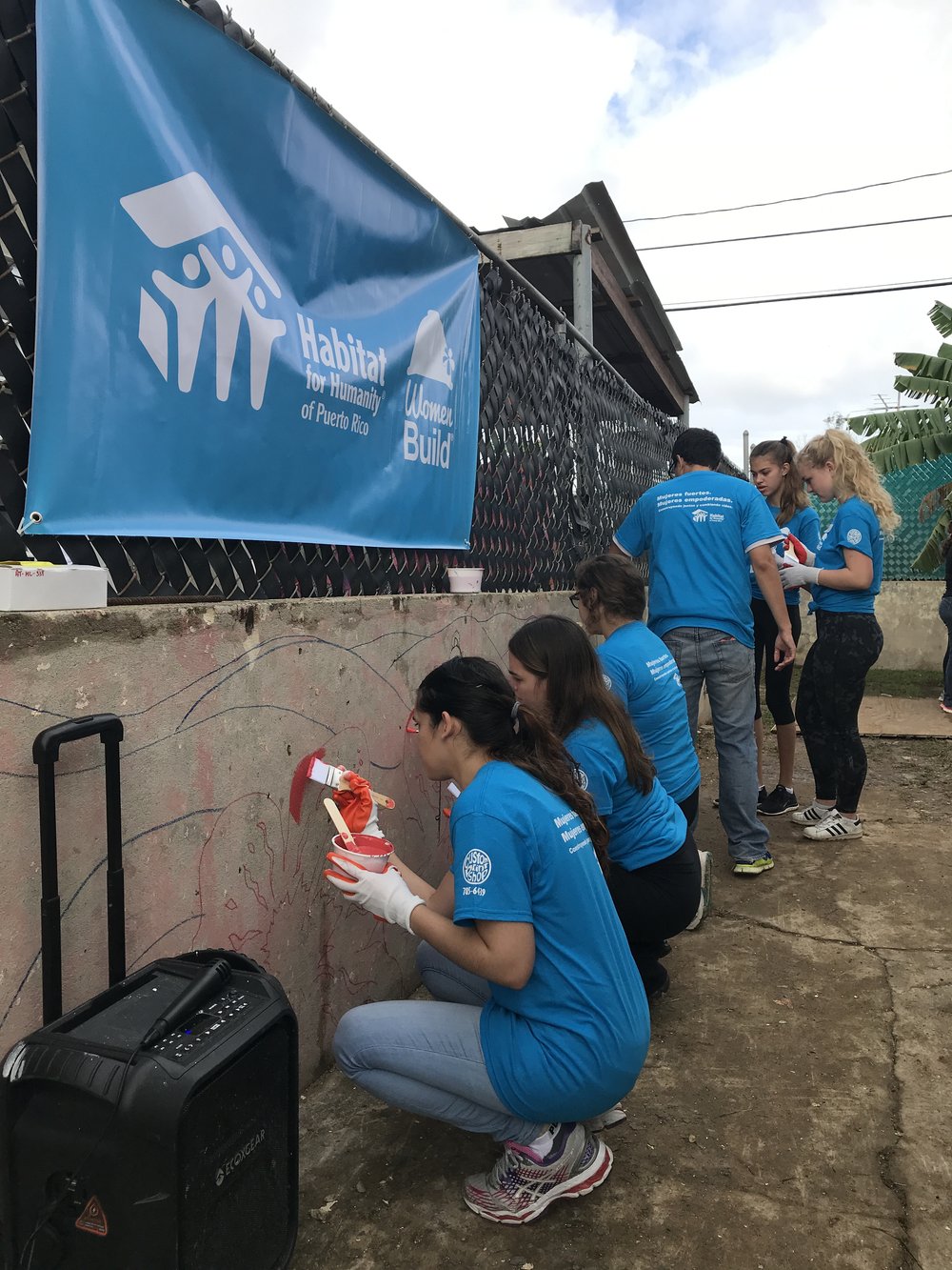  Volunteers working on reconstruction of home 