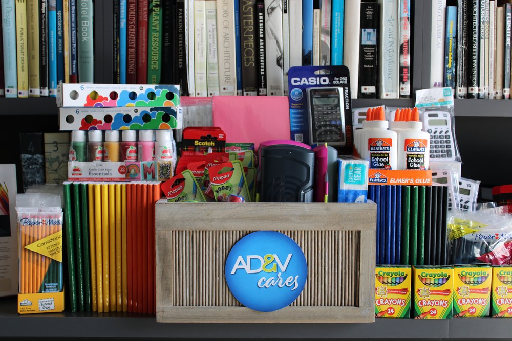  School supplies placed on top of table. 