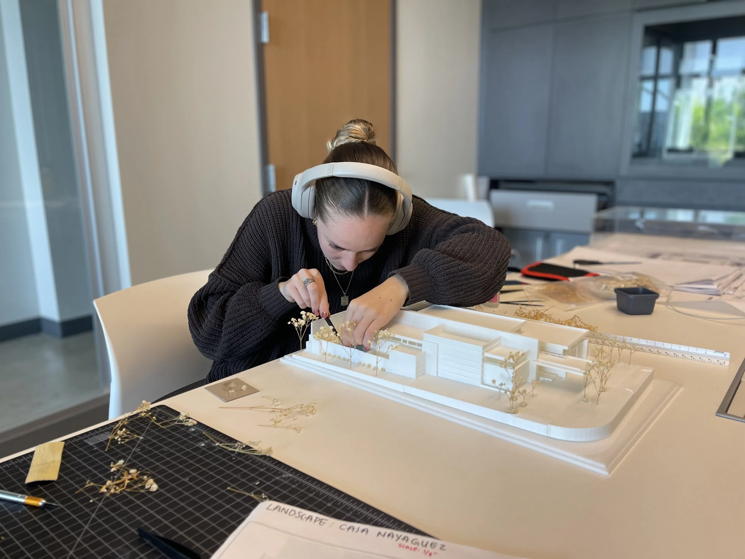 AD&V intern working on a project model.