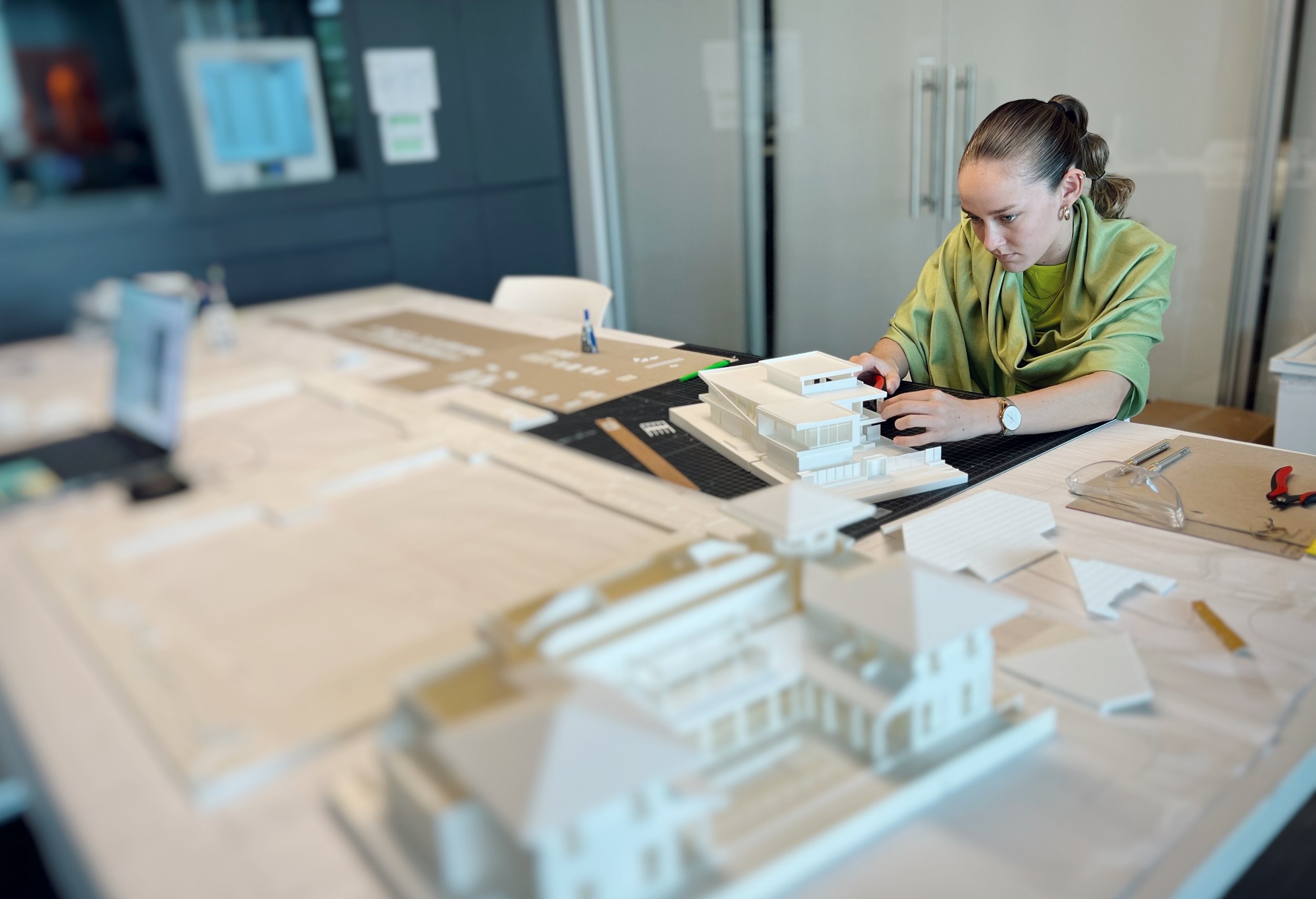 AD&V intern working on a project model.